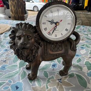 Bronze quartz Lion Clock with Roman Numerals